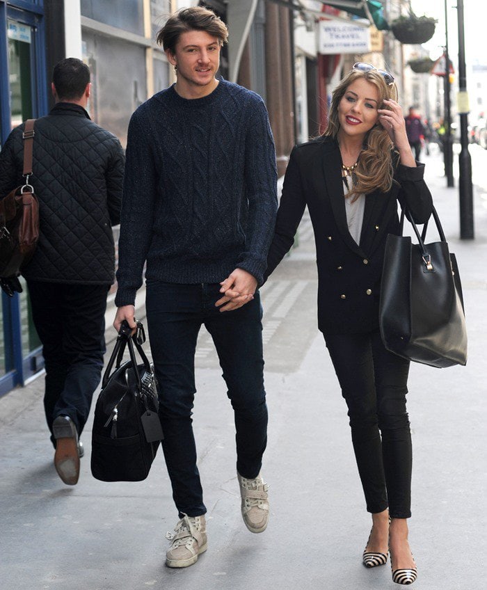 Lydia Bright shows off her new darker, longer hair while out and about in central London with boyfriend Tom Kilbey