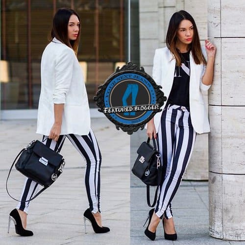 Mariann styled striped pants with a white blazer and a black printed top