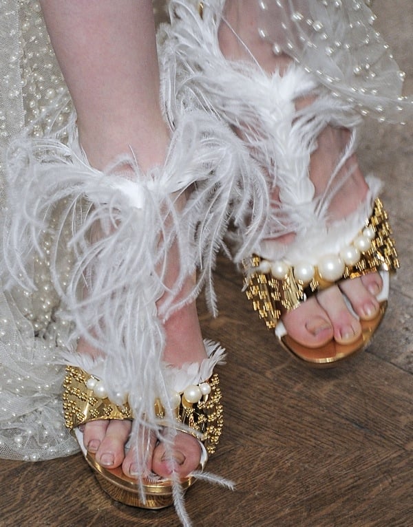 What is up with this model's toenails!?