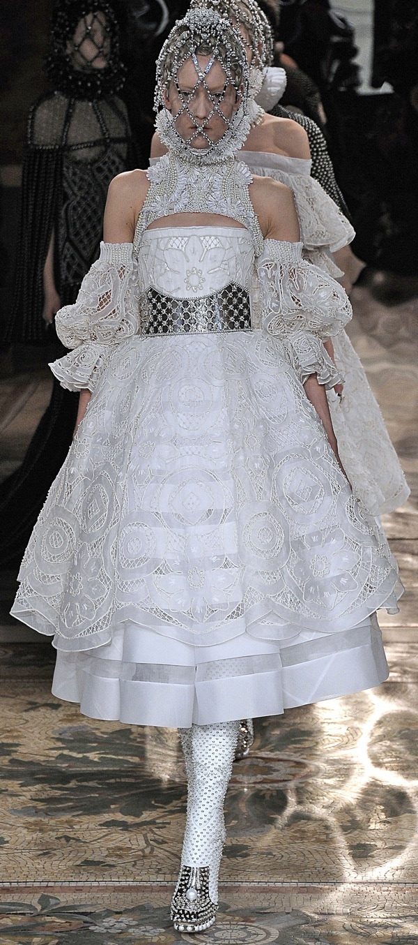 A model walks the runway at the Alexander McQueen Autumn Winter 2013 fashion show