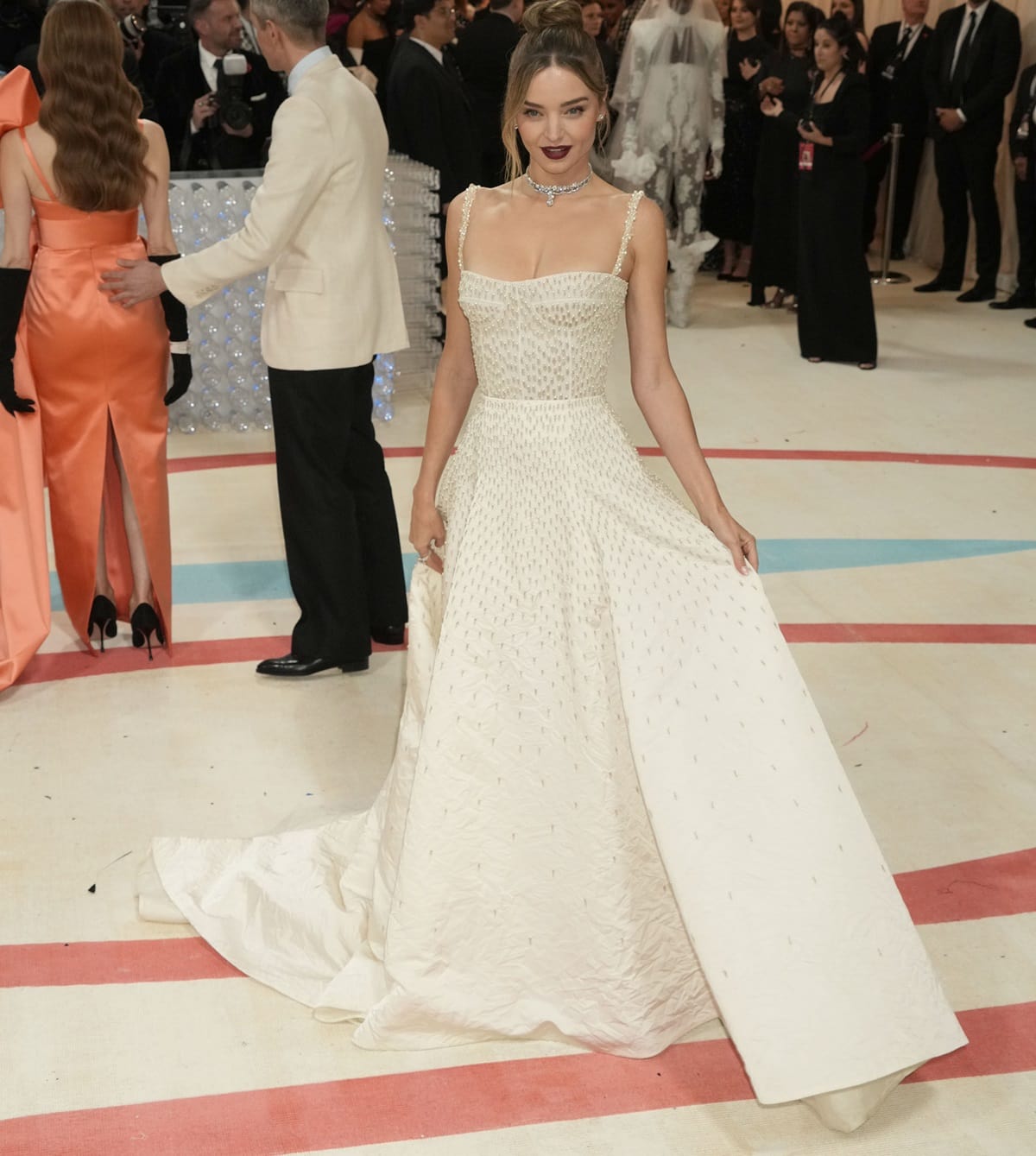 Miranda Kerr turned heads in a stunning ensemble by Dior Haute Couture at the 2023 Met Gala Celebrating "Karl Lagerfeld: A Line Of Beauty"