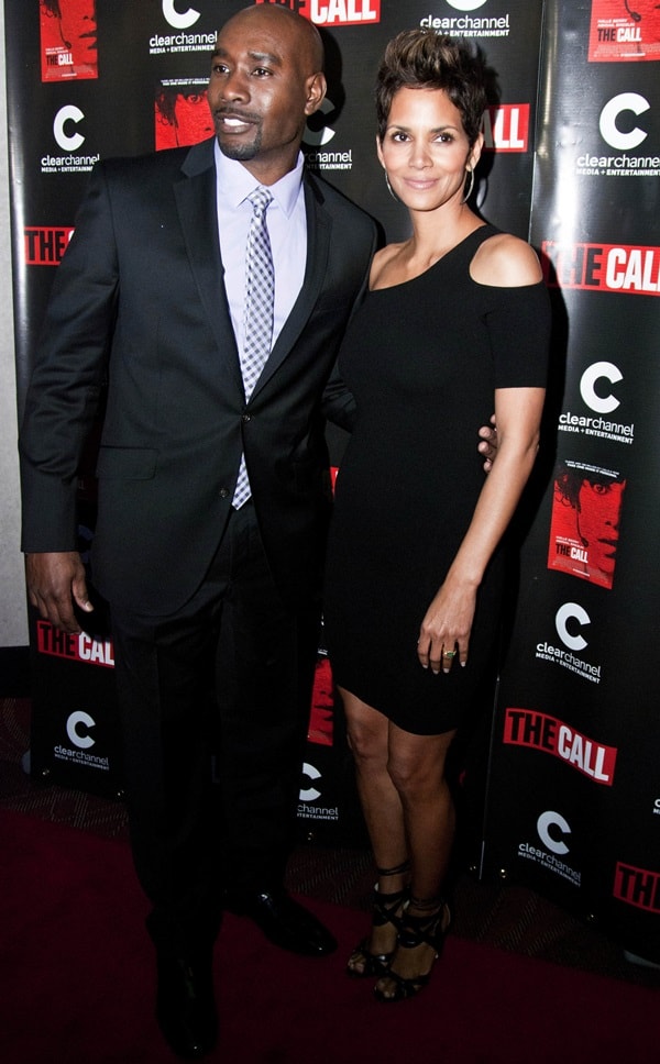 Morris Chestnut and Halle Berry attend The Call screening at the Showplace Icon Theater in Chicago on February 28, 2013, with Berry stunning in a sleek black cold-shoulder dress paired with strappy Brian Atwood sandals