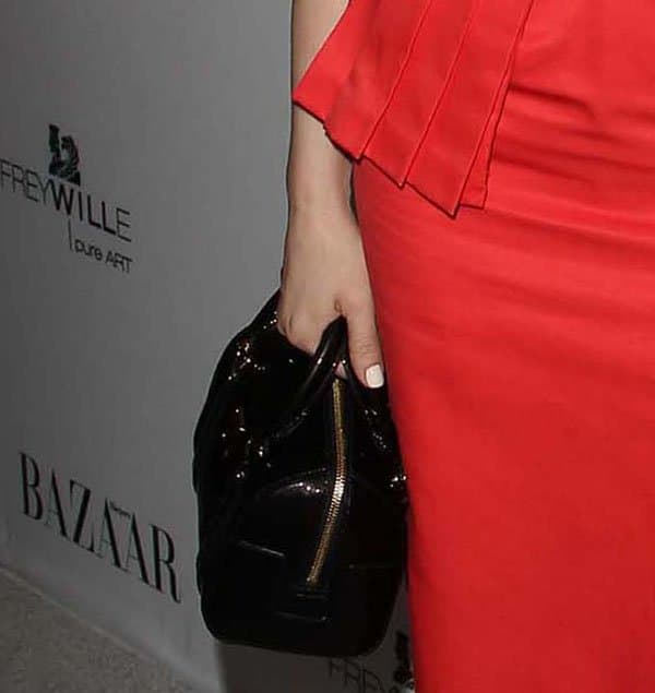 Rose McGowan carried a black MCM 'Boston' bag