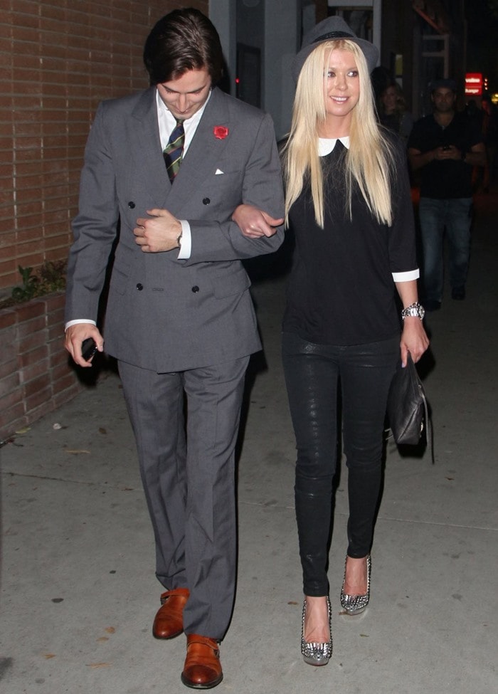 David Schechtman and actress Tara Reid arrive at Park Place A Solo Show By Alec Monopoly At LAB ART