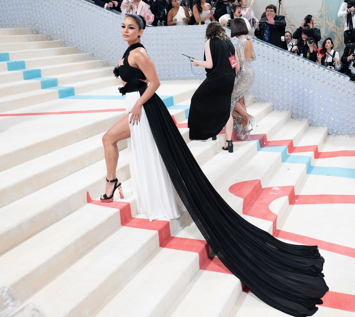 Vanessa Hudgens made a striking appearance at the 2023 Costume Institute Benefit celebrating "Karl Lagerfeld: A Line of Beauty" at the Metropolitan Museum of Art on May 1, 2023, in New York City, captivating everyone as she stepped onto the red carpet