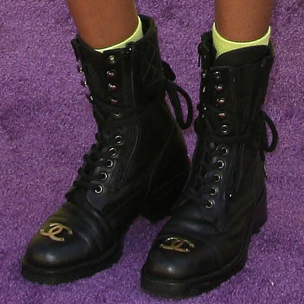 Willow Smith wears yellow socks with black Chanel high-top boots