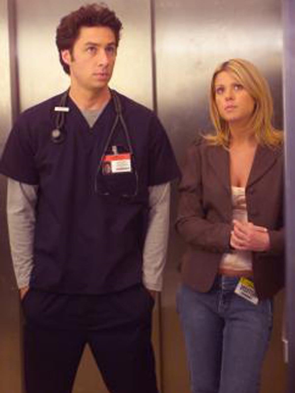 Zach Braff portrays John Michael "J.D." Dorian and Tara Reid as Danni Sullivan in the American medical comedy-drama television series Scrubs