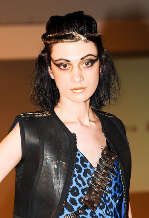Birmingham Fashion Week 2013: A model captivates with a bold leopard print and leather vest, crowned with a golden braided headband