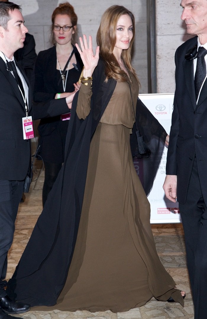 In a stunning display of grace, Angelina Jolie dons Saint Laurent, dedicating her appearance to Malala's cause at the Women in the World Summit, NYC