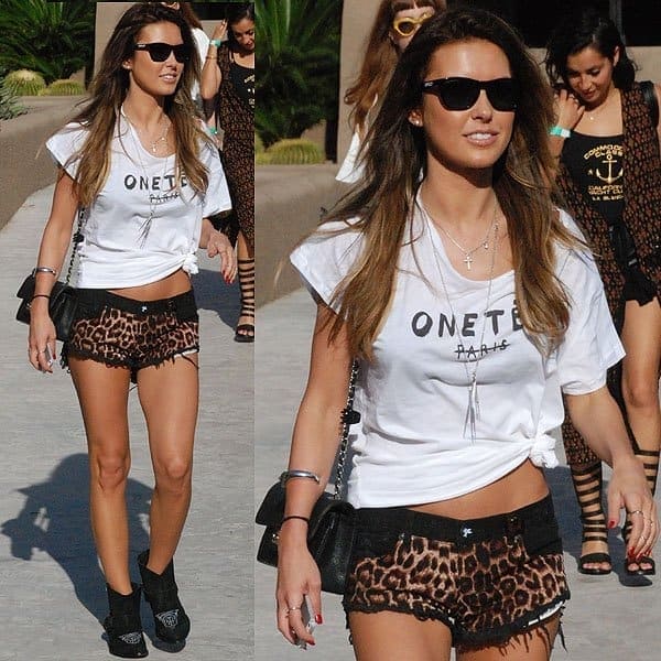 Audrina Patridge's choice of a knotted t-shirt and short shorts blends into the background, lacking distinctiveness at Coachella