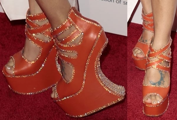 Bai Ling shows off her feet in orange crystal-trimmed heel-less sandals