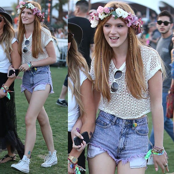 Bella Thorne's combination of a flower headband with high-cut acid-wash denim shorts captures the essence of youthful Coachella flair