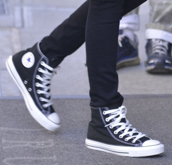 Carly Chaikin loves her black and white Chuck Taylors