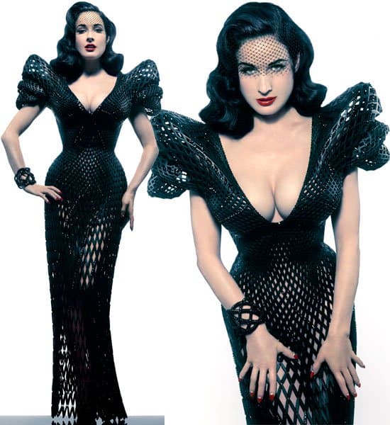 Dita Von Teese models the pioneering 3D-printed dress adorned with over 12,000 Swarovski crystals, showcasing a blend of fashion and technology