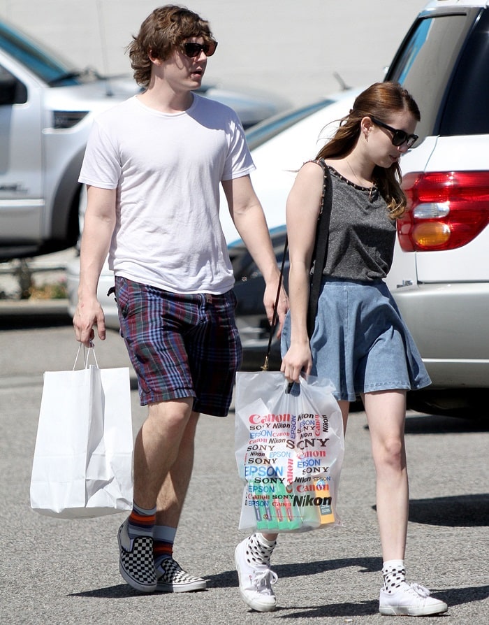 Emma Roberts finished off her outfit with white casual sneakers from Superga