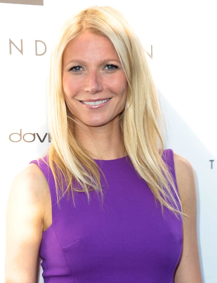 At the launch of Tracy Anderson's Brentwood studio in Los Angeles on April 4, 2013, Gwyneth Paltrow elegantly donned a Victoria Beckham purple silk and wool-blend mini dress