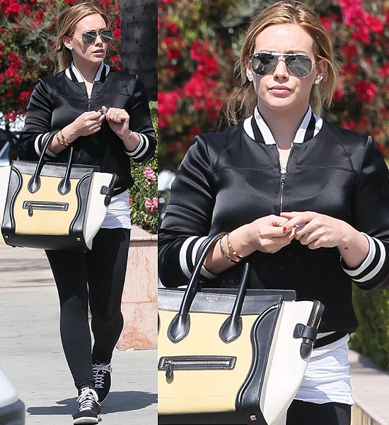Hilary Duff effortlessly stylish in a varsity jacket while shopping in West Hollywood, March 2013