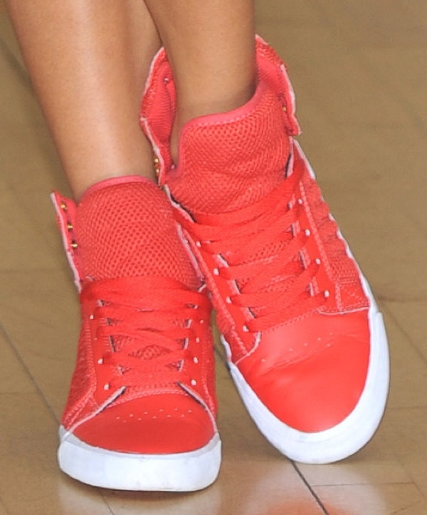 Jade Ewen wearing 'Skytop' sneakers from Supra in red