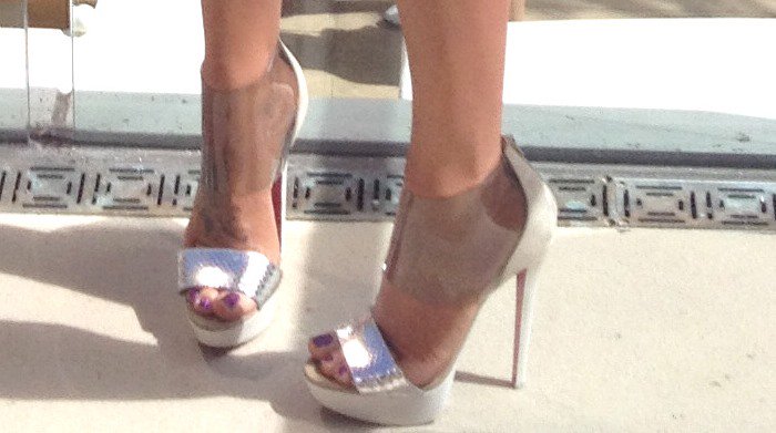 Jenny McCarthy's feet in silver-and-clear Christian Louboutin heels