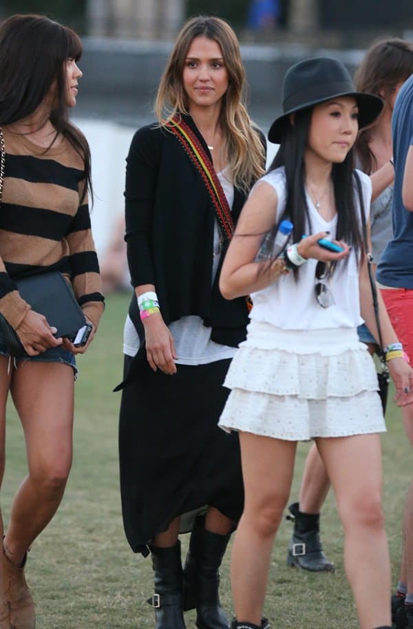 Jessica Alba embraces the Coachella vibe with a bold yet controversial mix of boho and goth elements, stepping out in Indio, California, for the festival's second week, April 19, 2013