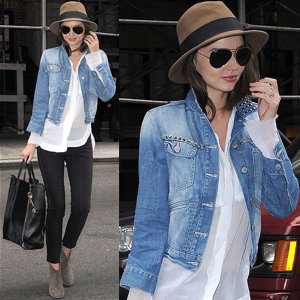 For running errands, Miranda Kerr opted for a casual chic ensemble featuring an Isabel Marant studded denim jacket, Stella McCartney side-panel trousers, Isabel Marant ankle boots, a Willow pocket blouse, a Celine tote, Ray-Ban aviators, a Rag & Bone fedora, and a Louis Vuitton bag charm