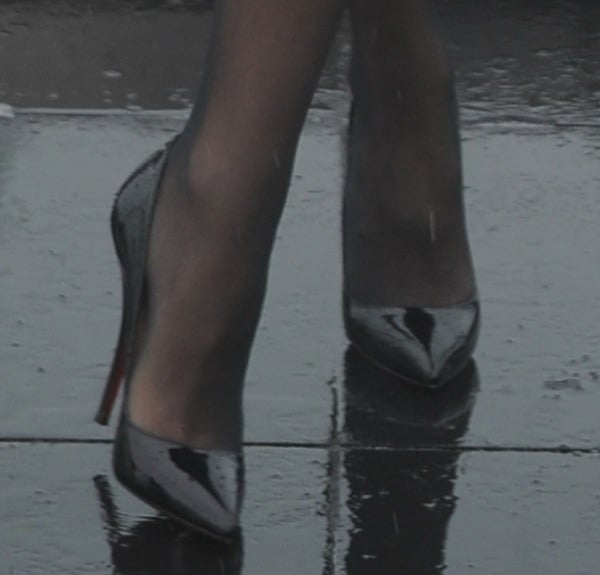 Olga Kurylenko's hot feet in black stockings and Batignolles pumps
