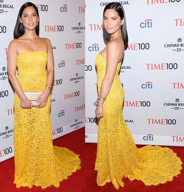 Olivia Munn in a pretty lace strapless yellow Michael Kors dress