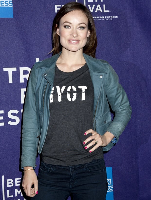 Dressed in a striking green leather jacket and blue skinny jeans, Olivia Wilde embodies the anti-it girl aesthetic at the Tribeca Film Festival's Shorts Program in New York City, April 22, 2013