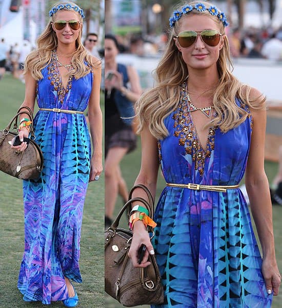 At Coachella on April 13, 2013, Paris Hilton sported a Camilla Lost Gardens of Heligan exclusive halter dress, accessorized with Prada tassel bow ballet flats in blue, a That Madonna Girl Toni headband, Nissa Jewelry Roxy cuff, and a Paris Hilton bag
