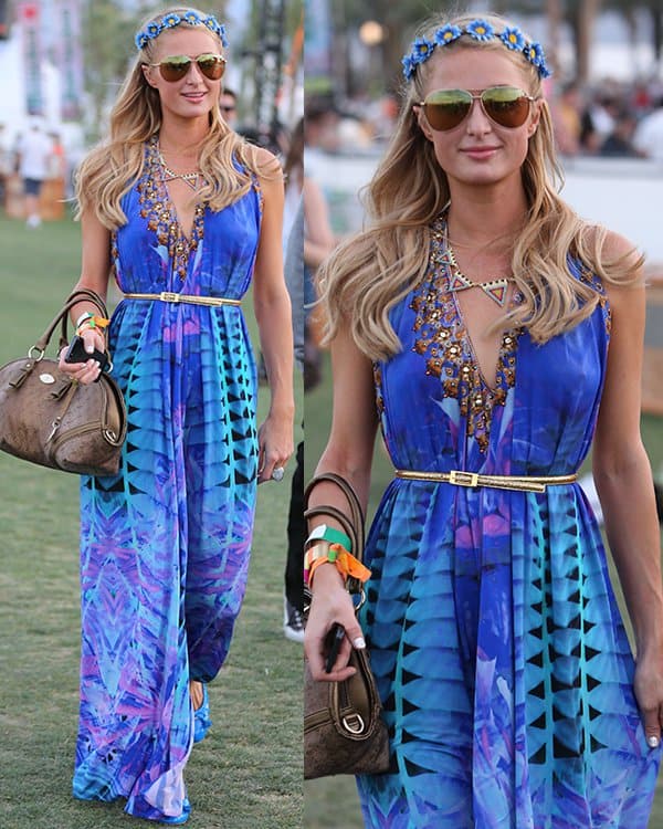 On April 13, 2013, at Coachella, Paris Hilton showcased her festival flair in a Camilla Lost Gardens of Heligan Exclusive Halter Dress, paired with Prada Tassel Bow Ballet Flats in blue, accented with a That Madonna Girl Toni Headband, Nissa Jewelry Roxy Cuff, and carrying a Paris Hilton Bag