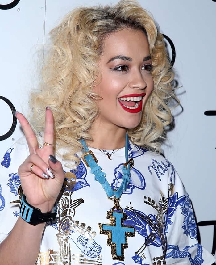 Curly-haired Rita Ora hosting a night at TAO Nightclub