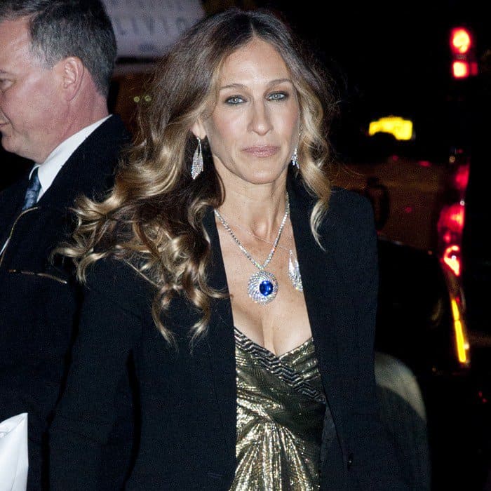 Sarah Jessica Parker wore a gold Vicky Tiel dress under a black blazer by Yeojin Bae