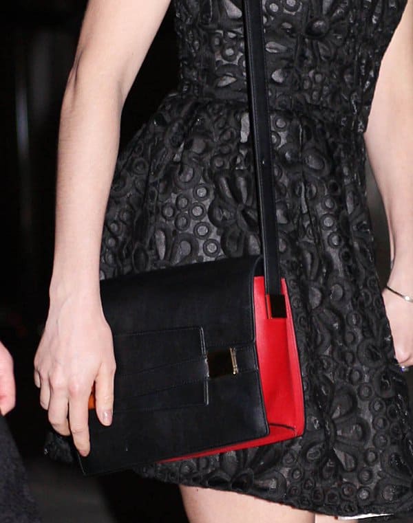 Elegance in Accessories: Sienna Miller with her chic Delvaux Madame PM shoulder bag at the 2013 Tribeca Film Festival