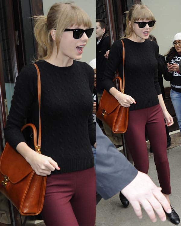 Taylor Swift was spotted leaving her hotel in New York on March 27, 2013, wearing Ray-Ban 2140 Original Wayfarer sunglasses, a Mark Cross Scottie Large Flap Satchel in Cuoio, Theory Testra Tailor pants, and a 525 America Mercerized Cotton Cable crewneck