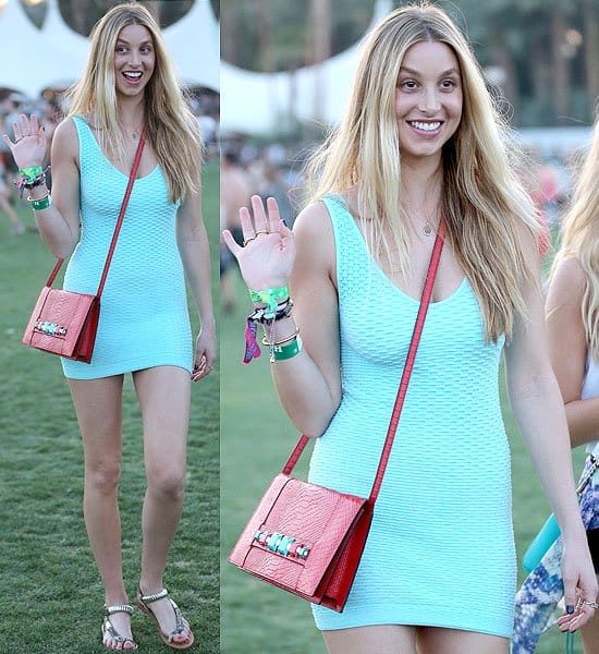 For the 2013 Coachella Music & Arts Festival, Whitney Port rocks a blue cutout dress from her own label, Whitney Eve, accessorized with a statement ring from Nashelle