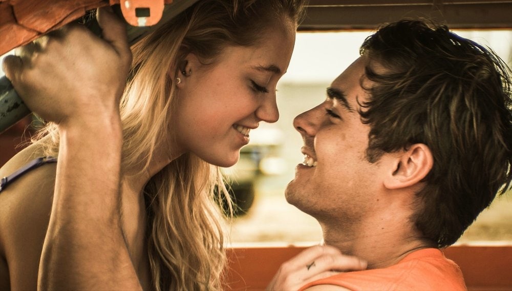 Zac Efron as Dean Whipple and Maika Monroe in her film debut as Cadence Farrow in the 2012 American drama film At Any Price