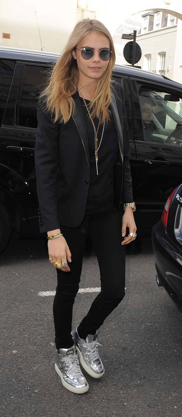 British model Cara Delevingne heading home after a Vogue seminar in London on April 27, 2013