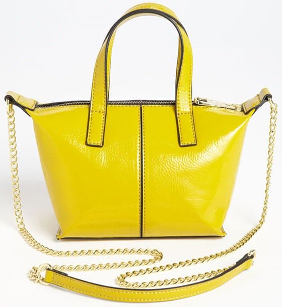 A sassy yellow satchel with a sleek silhouette provides a colorful kick for daily here-to-there activity
