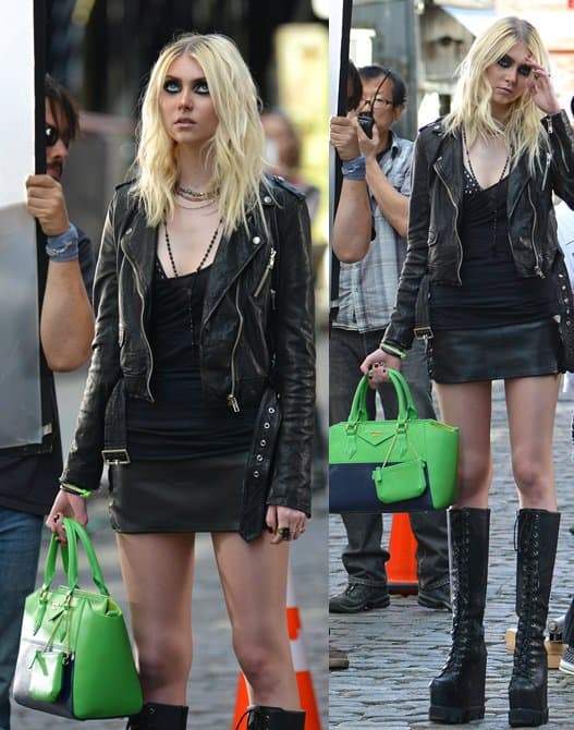 Taylor Momsen rocks gothic glamour: Striking a pose in knee-high boots and a fitted tank top, New York City
