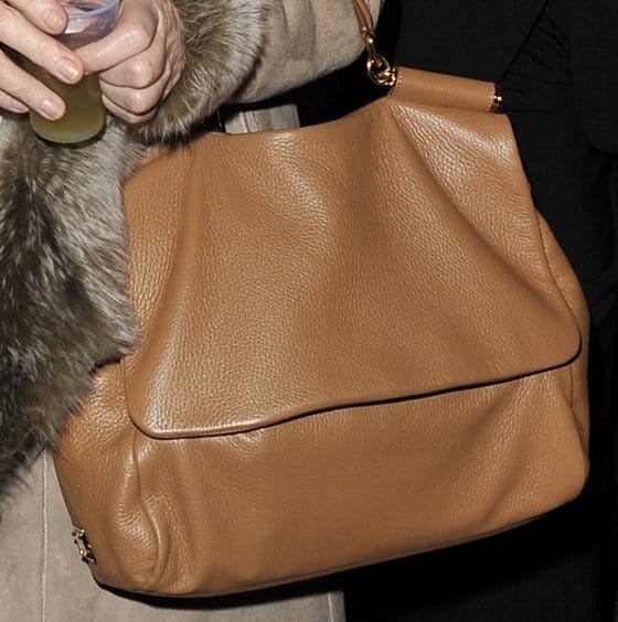 Close-up of Dame Helen Mirren's cherished beige Miss Sicily bag by Dolce & Gabbana