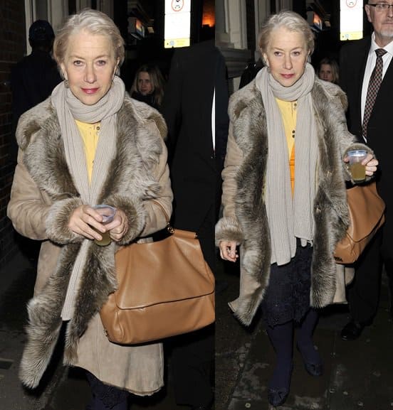 Dame Helen Mirren wears a cozy fur-trimmed coat paired with a beige Dolce & Gabbana Miss Sicily bag while exiting the Gielgud Theatre