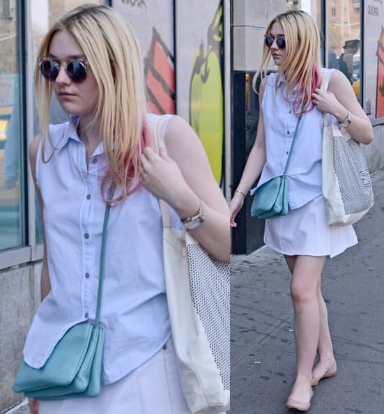 On April 9, 2013, in New York City, Dakota Fanning showcased a chic ensemble featuring an Acne denim mini skirt, a sleeveless shirt, Chloe scalloped ballerina flats, Quay sunglasses, accessorized with a Cartier bracelet, a Michael Kors watch, and a Celine Trio Bag in Glacier