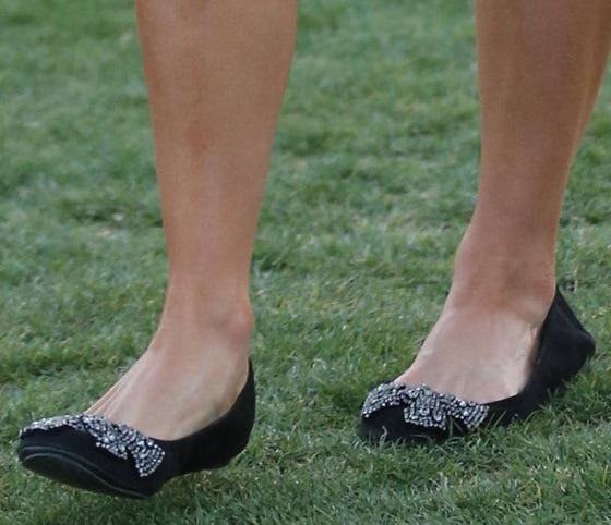 Paris Hilton wearing flats with her boho dresses at the Coachella Music Festival, April 12–14, 2013