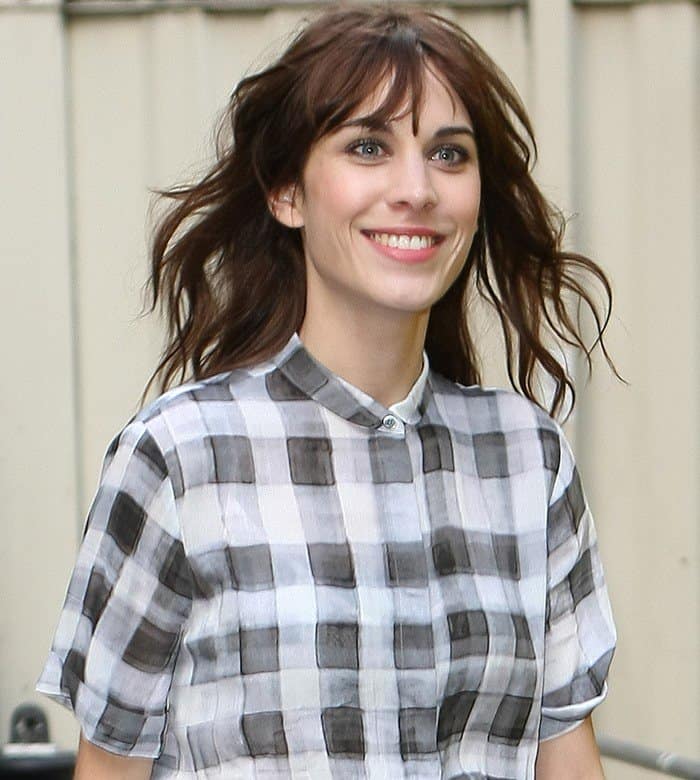 Alexa Chung captured leaving a Vogue seminar in London, effortlessly stylish in her daytime outfit, April 27, 2013