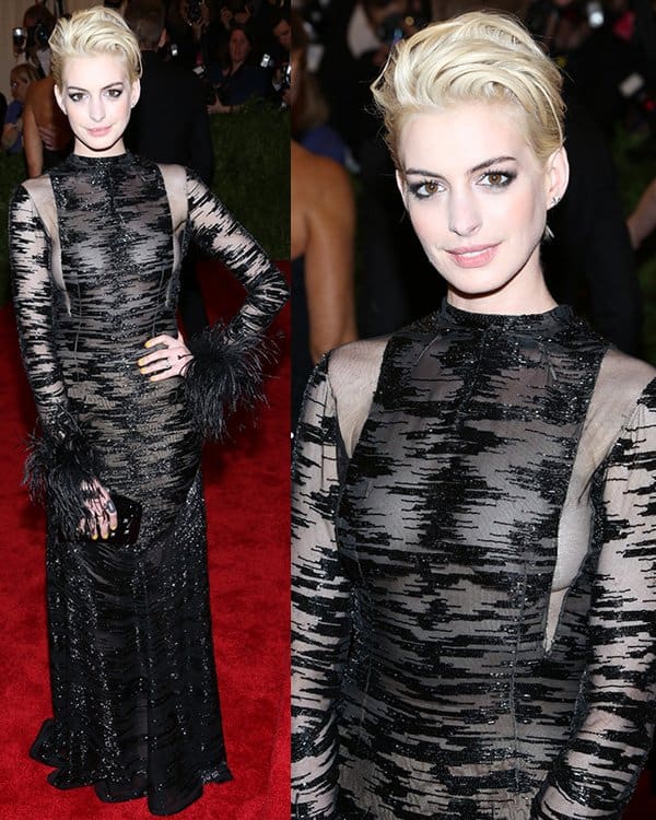 Anne Hathaway goes bold with a new blonde do and a revealing Valentino gown at the Met Gala