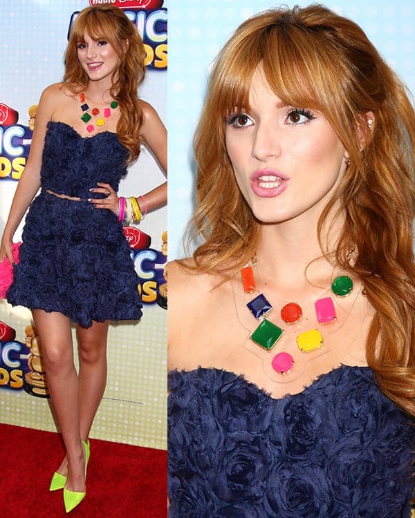 Bella Thorne accessorized her outfit with jewelry from Kate Spade and Elephant Heart and carried a Glint clutch, completing her chic and polished look
