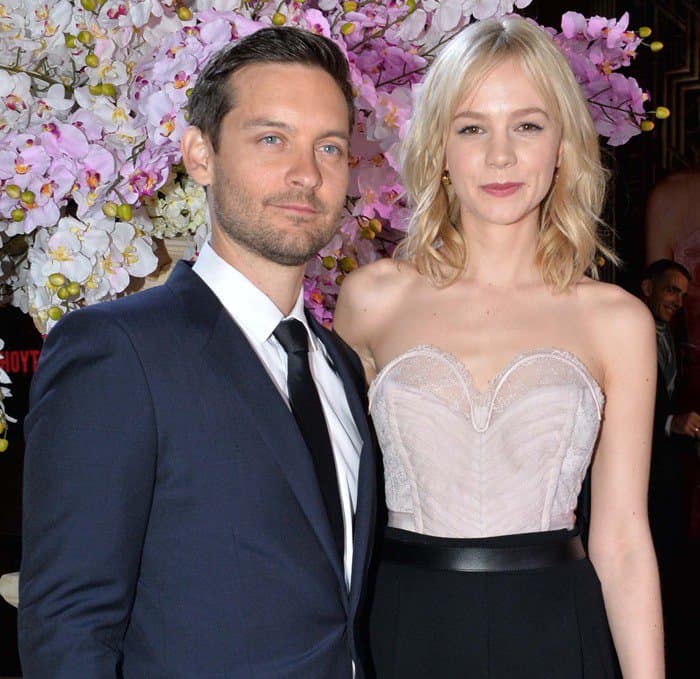 Carey Mulligan stands taller than Tobey Maguire at the Sydney premiere of 'The Great Gatsby', thanks to her clever choice of high heels