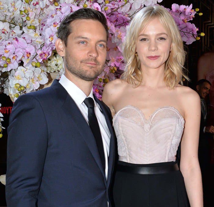 Carey Mulligan posing with Tobey Maguire