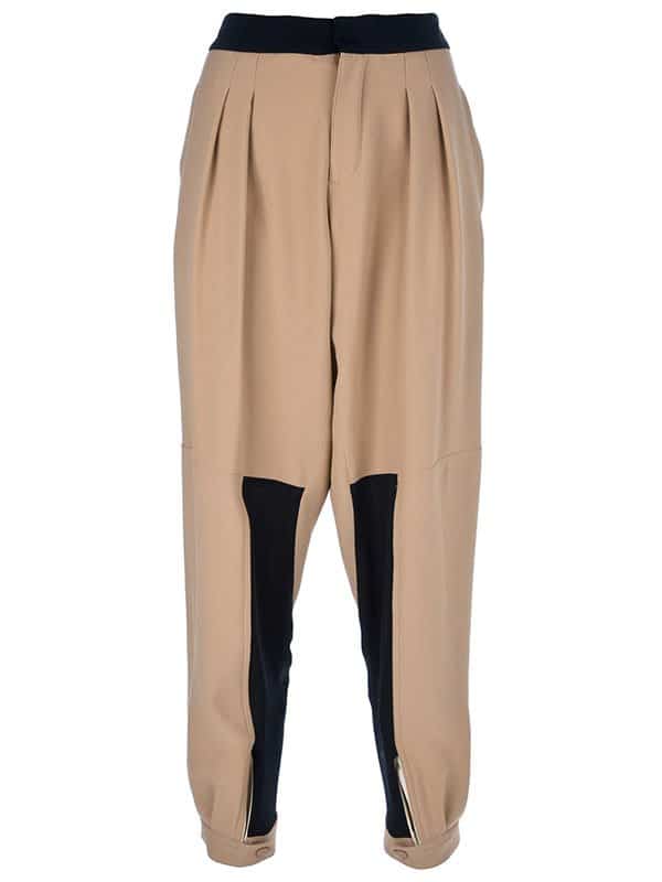Detail shot of Victoria Beckham’s relaxed tapered trousers by Chloe, combining comfort and style at $644.87
