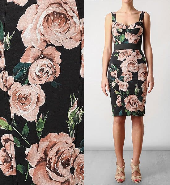 This sexy Dolce & Gabbana bustier dress features a lush floral print that gives a nod to traditional sofa upholstery